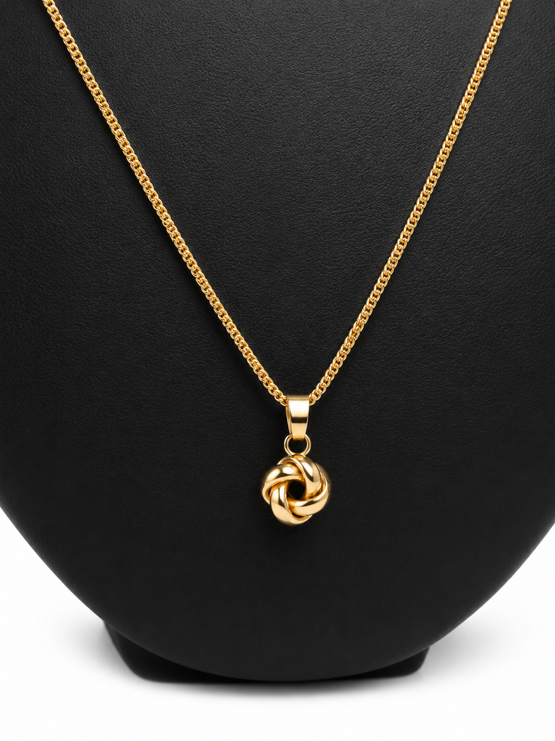 Franco chain with Knot charm. 10kt Gold - 1.5mm/22".